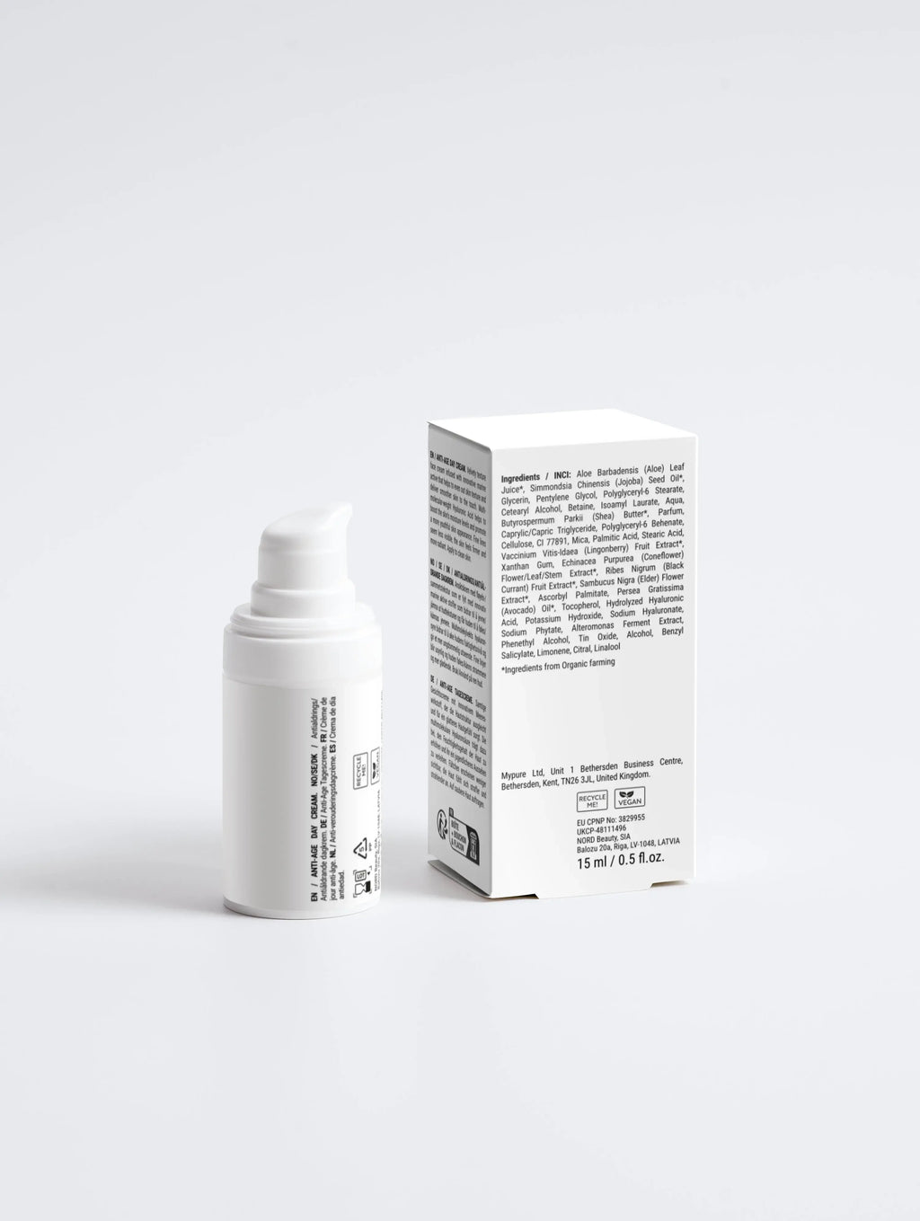Witte skincare pompflacon en verpakking met ingrediëntenlijst op witte achtergrond, 15 ml
