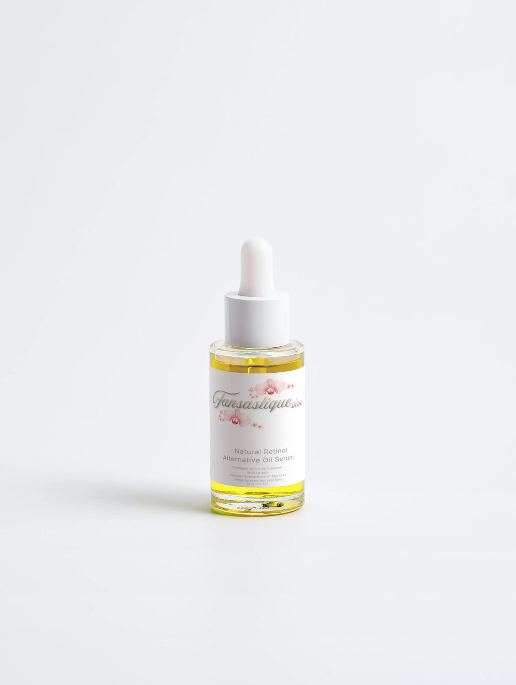 Glazen flesje met gezichtsolie serum, pipetdop, tegen witte achtergrond, skincare product